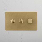 Antique Brass 3G Mixed Switch 2T1D with two toggles and a dimmer knob on a textured backdrop.