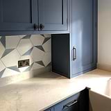 Bronze Kilburn Furniture Knob On Blue Kitchen Cabinets