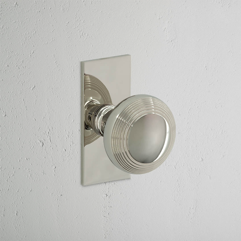 Poplar Short Plate Sprung Door Knob – Polished Nickel