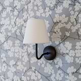 Malvern Medium Wall Light Alabaster White with bronze accents adds classic elegance to any room.