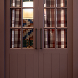 Harper Double Pull Handle 320mm in bronze attached to a door, emphasizing its medium size and elegant design.