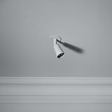 Paintable 'Pembroke Spotlight 35mm' in a gray ceiling with molding, customizable to match any decor.
