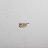 Antique brass Oxford Furniture Handle 36mm displayed prominently against a white textured background.