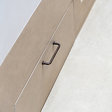 Sycamore Furniture Handle 128mm in bronze enhances a light-hued cabinet with elegant style. Small pull handle design.