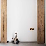 antique brass vintage double socket UK next to lamp