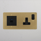 Antique brass black 2G wall plate with single socket and USB A+C fast charge ports.