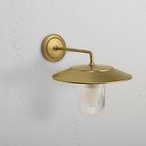 Kensington Wall Light Fluted Glass in antique brass with ribbed glass shade, mounted on a white wall.