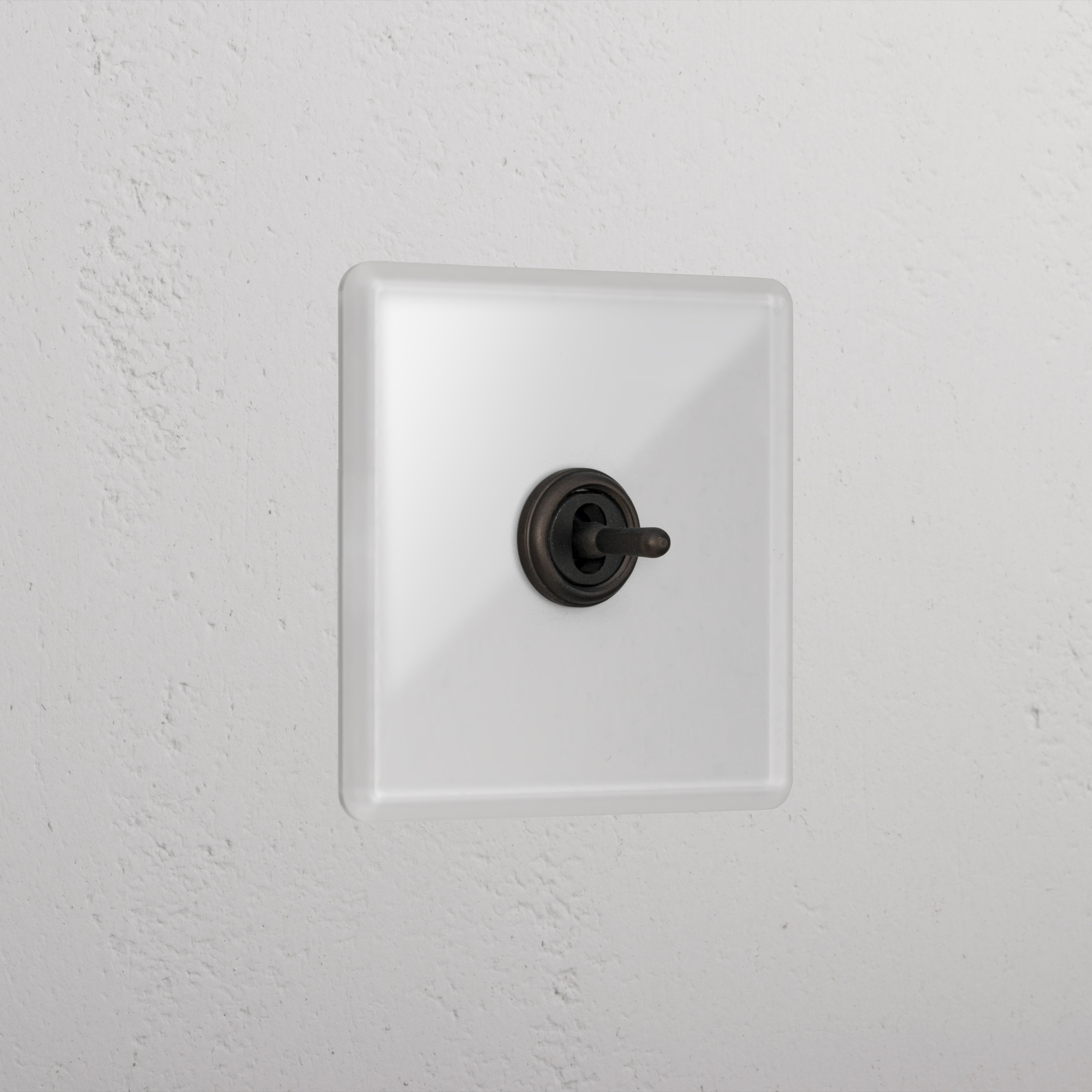 1G Centre Retractive Toggle Switch - Clear Bronze