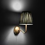 Medium Malvern Wall light in Deep Green at an angle and turned on at night