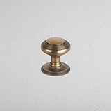 Antique Brass Poplar Unsprung Door Knob On White Background