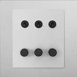 '6G Mixed Switch 3T3D - Paintable Bronze' with three black switches and three knobs, suitable for 6G Switches & Dimmers.