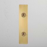 Antique brass 2G architrave two-way toggle switch, ideal for coordinating with classic interior designs.