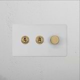 3G Mixed Switch 2T1D in paintable antique brass with two toggles and one dimmer on a white panel.