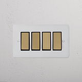 4G Two Way Rocker Switch in paintable antique brass black on a textured white wall.
