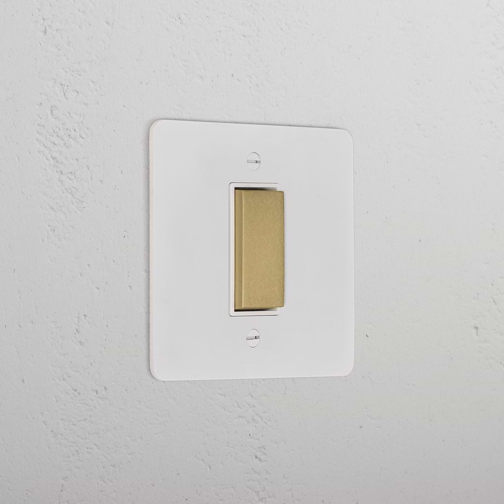 1G Centre Retractive Rocker Switch _ Paintable Antique Brass White