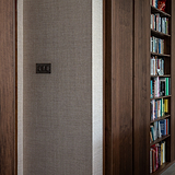 3G Two Way Rocker Switch in bronze black finish for 3G Switches & Dimmers, mounted on a textured wall.