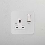 Paintable white Single Socket UK, 1G socket with switch, suitable for personalized decor against light-textured surfaces.