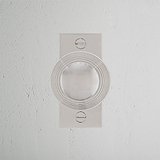 Poplar Short Plate Fixed Door Knob in polished nickel, displayed on a white surface.