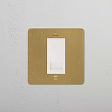BT Master Socket - Antique Brass White with metallic plate on a textured white wall.