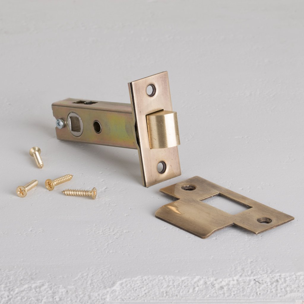 Antique Brass Light Latch 60mm On White Background