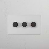 3G Dimmer Switch in paintable bronze finish with three round black buttons on a rectangular panel.
