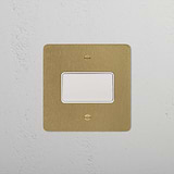 Fan Isolator Switch, Antique Brass White finish, on a textured white wall.
