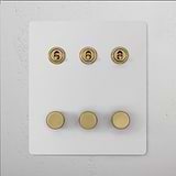 6G Mixed Switch 3T3D with paintable antique brass finish, featuring switches and dimmers.