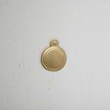 Antique Brass Canning Covered Key Escutcheon on White Background