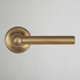 Antique Brass Harper Fixed Door Handle on White Background