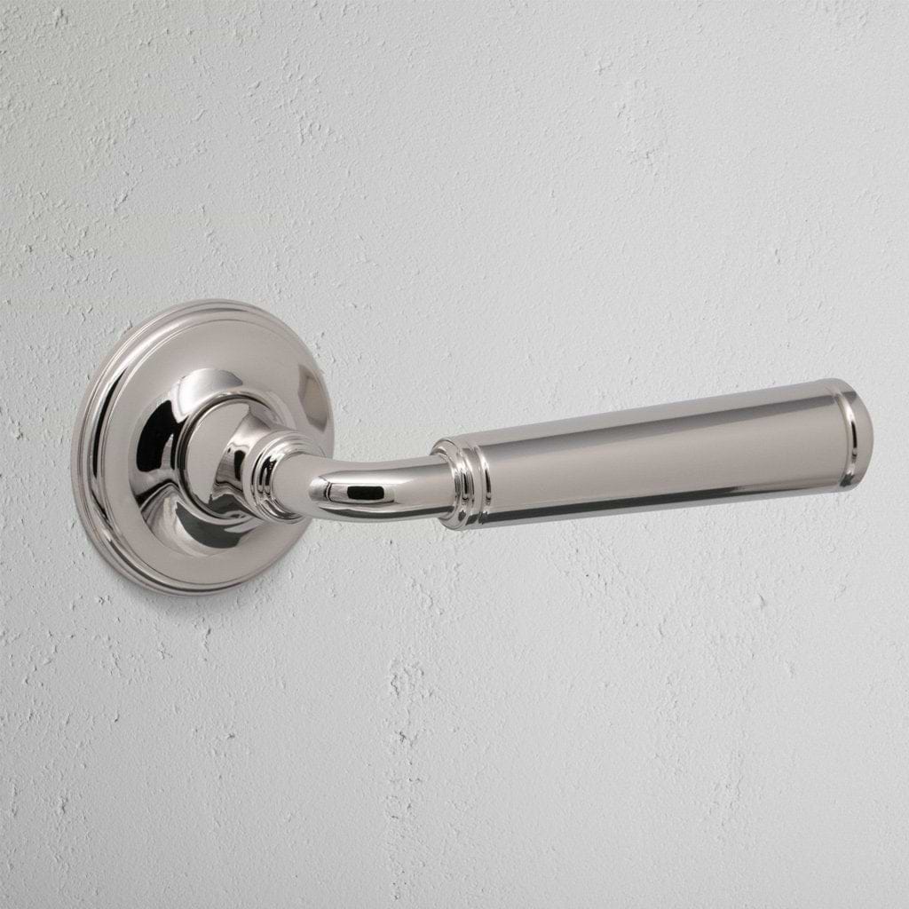 Polished Nickel Digby Unsprung Door Handle on White Background