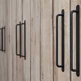 Bronze Kilburn Furniture Handles on Wooden Cupboards