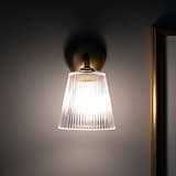 Wall Light Fluted Glass - Antique Brass on Grey Wall