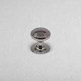 Polished Nickel Poplar Fixed Door Knob on White Background