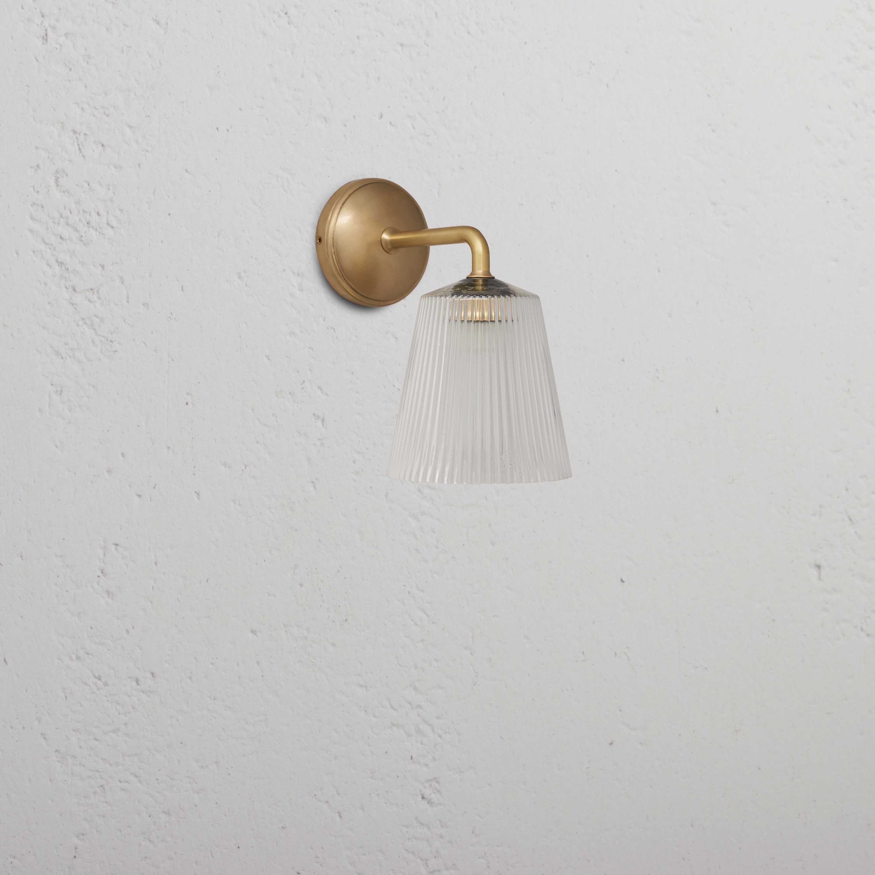 Wall Light Fluted Glass - Antique Brass on The Wall