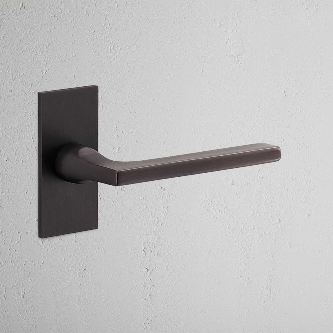 Clayton Short Plate Sprung Door Handle – Bronze  