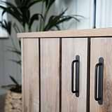 Bronze Kilburn Furniture Handle on Wooden Cupboard Furniture