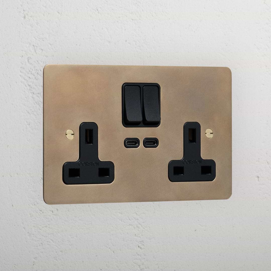 Designer antique brass double socket with USB-C fast charge black