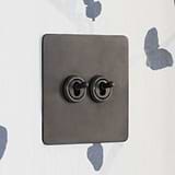 bronze 2G toggle switch on wallpaper