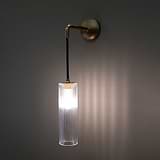 Antique Brass Hanging Light Turned ON on Wall with Fluted Glass