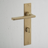 Clayton gefederter Türgriff langes Schild + Drehknopf – Antikes Messing