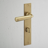 Digby gefederter Türgriff langes Schild + Drehknopf – Antikes Messing