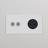 Zweifachrahmen mit 2x Kipphebelschalter + Schuko Typ F runder Steckdoseneinsatz – Lackierbar + Poliertes Nickel + Schwarz