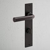 Apsley gefederter Türgriff langes Schild + Drehknopf – Bronze  