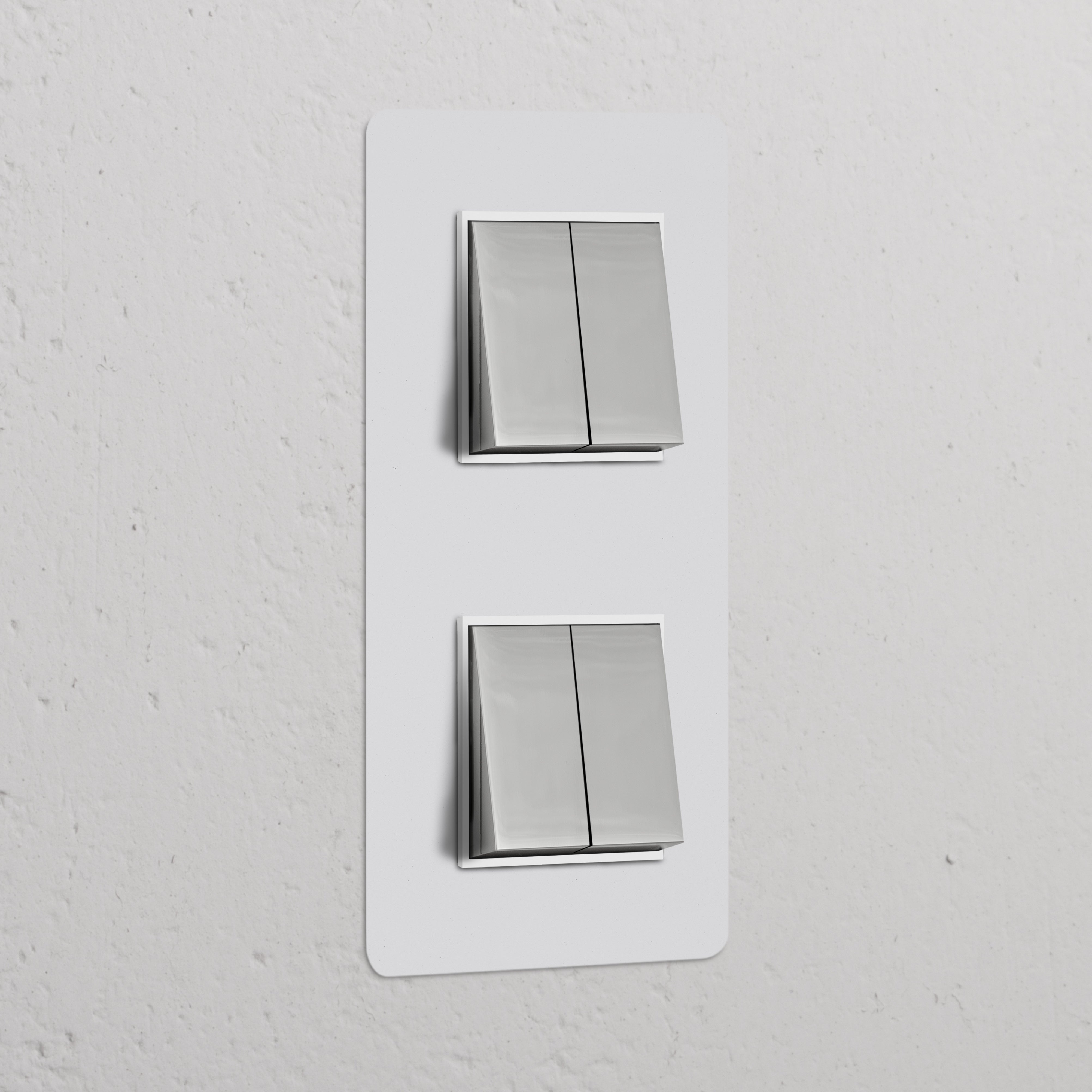 Vertikaler Doppelrahmen mit 4 Kippschaltern; lackierbar in Nickel glänzend und weiß; modernes und vielseitiges Design.