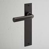 Manilla para puertas Apsley con placa larga (con muelle) - Bronce
