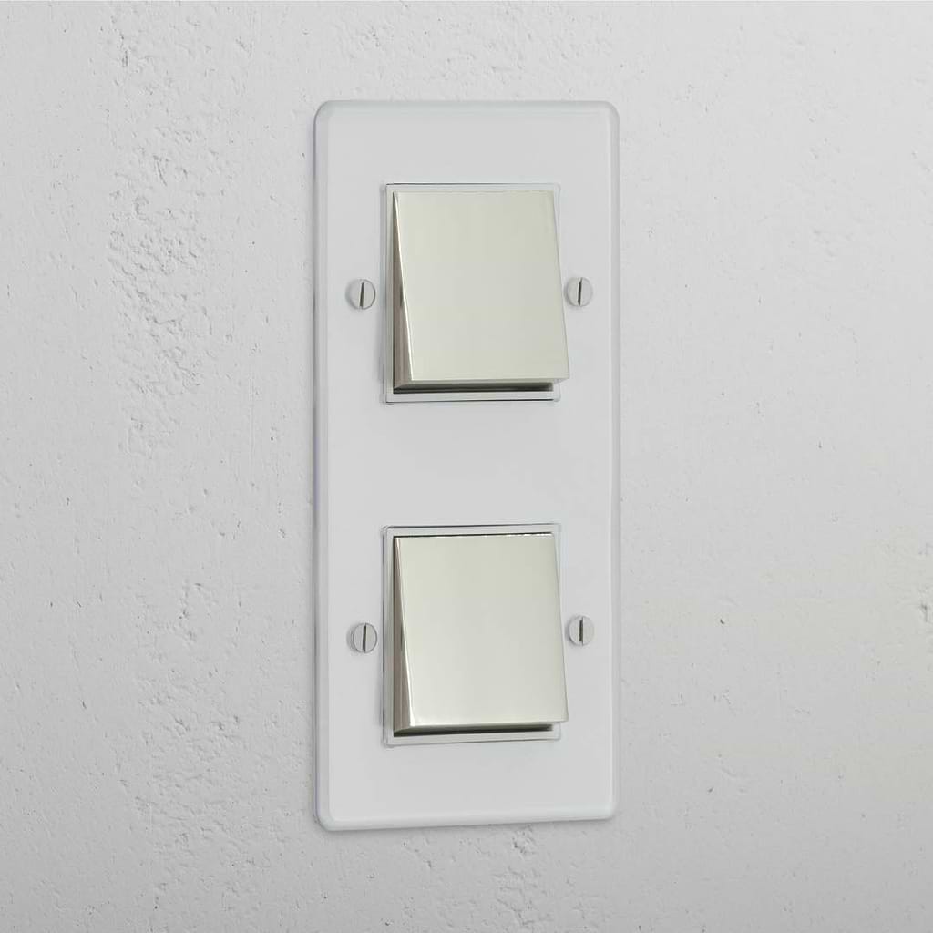 Interruptor doble de balancín en níquel pulido y traslúcido con blanco en diseño vertical - Solución eficiente para iluminación