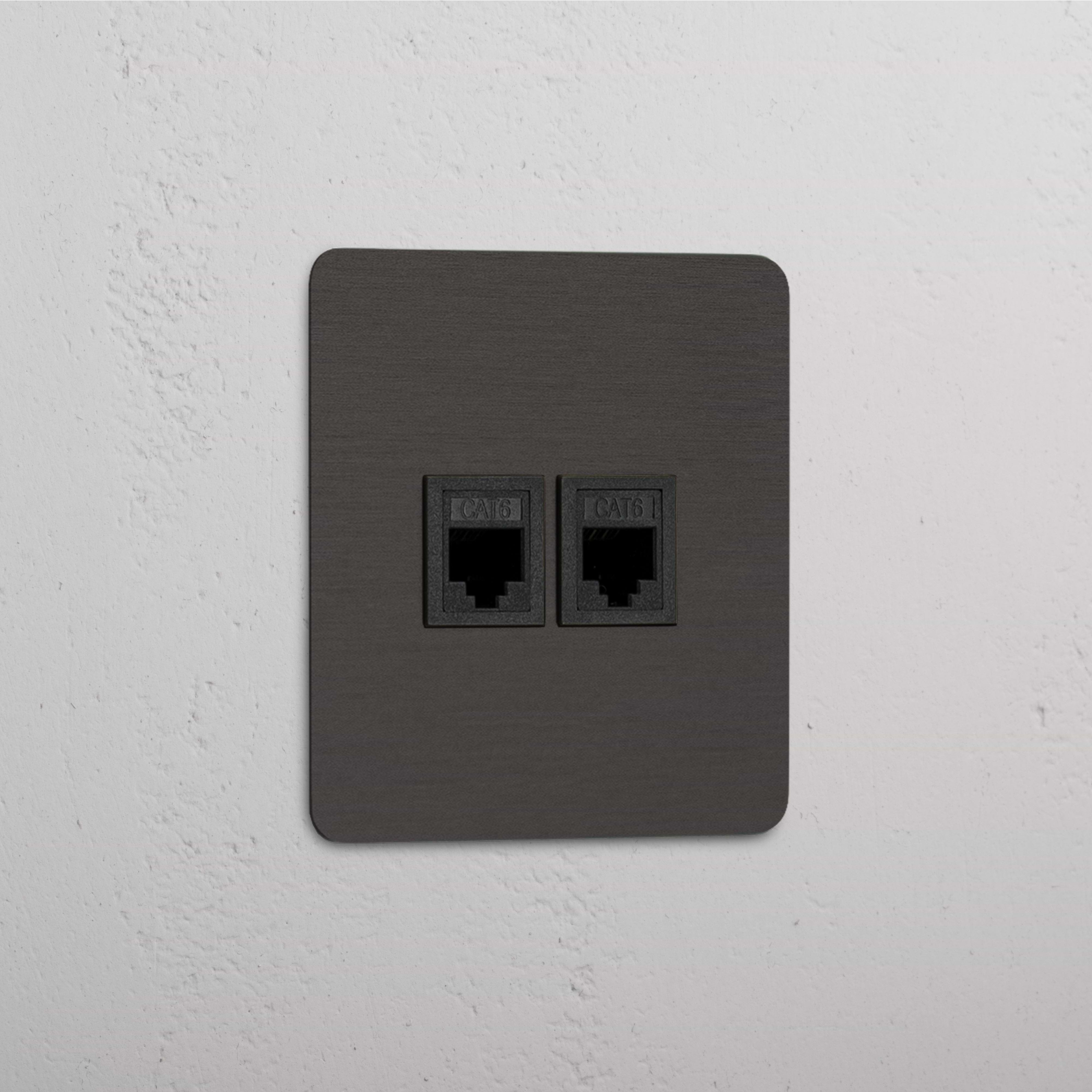 Módulo individual RJ45 en bronce y negro, eficiente con puertos dobles - Conexión de red estable