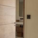 Manilla para puertas Clayton con roseta (con muelle) - Bronce