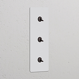 Interruptor conmutador de palanca x3 vertical (marco triple) - Pintable y bronce