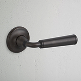Manilla para puertas Digby (con muelle) - Bronce